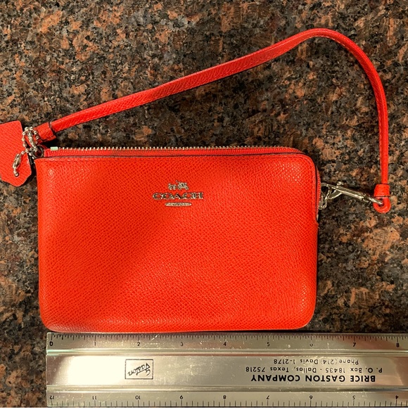 Coach Handbags - Coach Orange 4” x 6” wristlet
